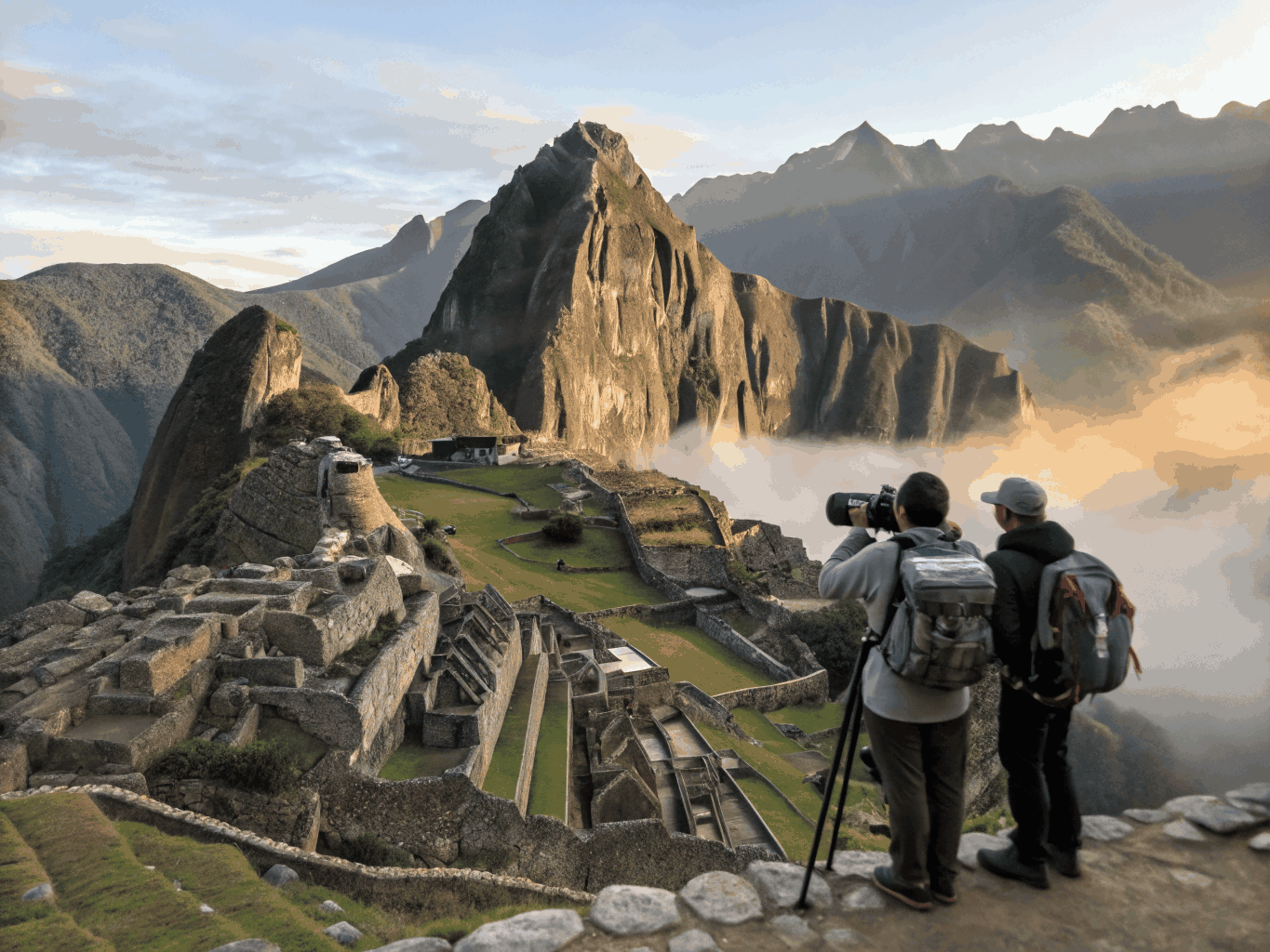 Expedition team overlooking the ancient ruins of Machu Picchu
