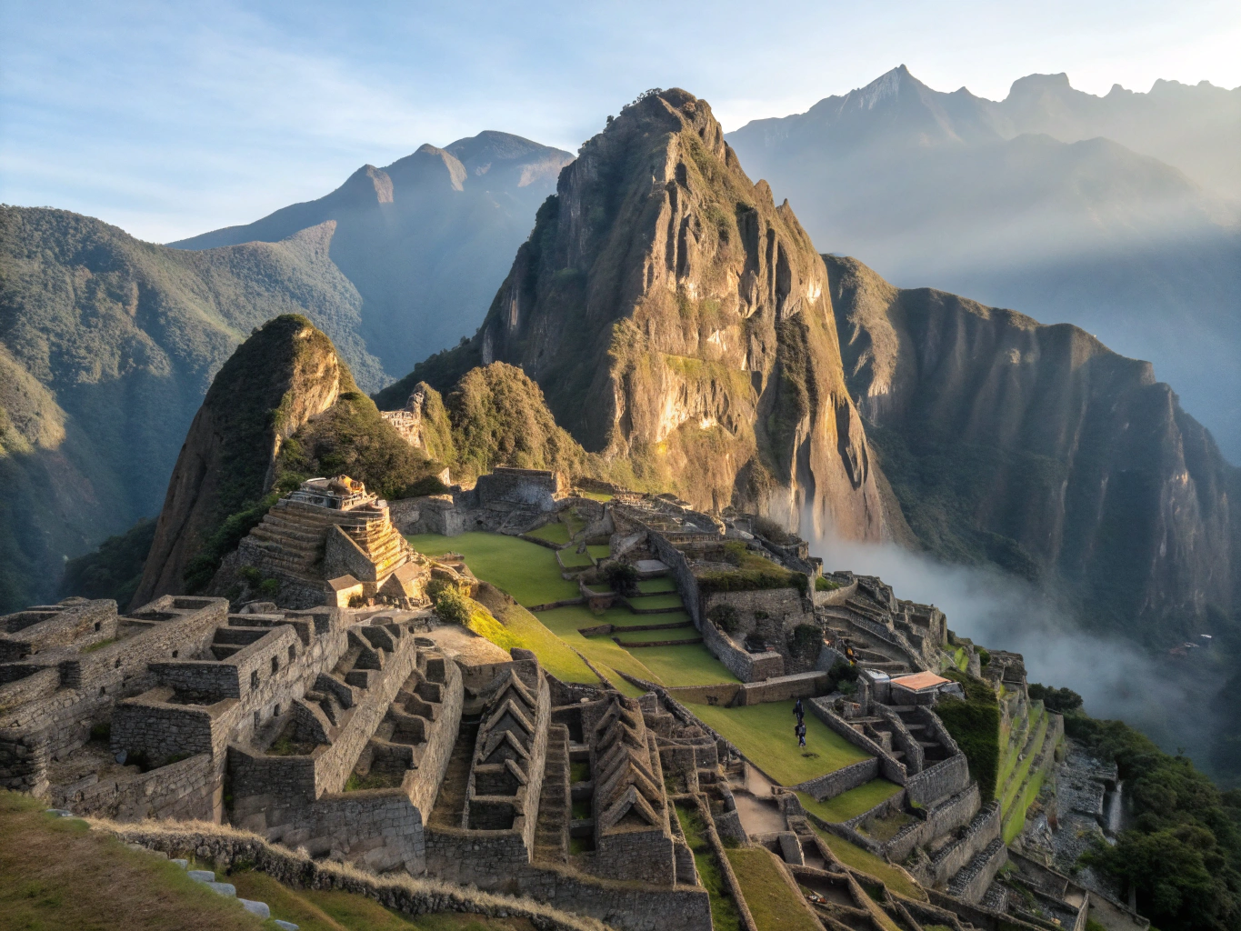 Classic view of the ancient Machu Picchu citadel under morning mist